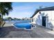 Backyard features a sparkling pool and a beautiful waterfront view at 1514 Sea Gull S Dr, St Petersburg, FL 33707