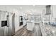 Bright kitchen with stainless steel appliances, center island and granite countertops at 1514 Sea Gull S Dr, St Petersburg, FL 33707