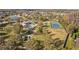 Aerial view of pool, tennis courts, playground, and amenities at Heron Preserve at 19429 Paddock View Dr, Tampa, FL 33647