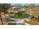 Playground featuring slides, swings, and climbing structures in a community setting at 19429 Paddock View Dr, Tampa, FL 33647