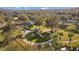 Community playground with slides and swings surrounded by green space and landscaping at 19429 Paddock View Dr, Tampa, FL 33647