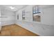 Large walk-in closet with built in shelving, carpeted floor and bright natural light at 19429 Paddock View Dr, Tampa, FL 33647
