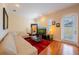 Cozy living room with a plush couch, a modern entertainment center, and neutral decor at 3410 Sondrio Cir, Tampa, FL 33611