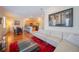 Bright open-concept living space showcasing hardwood floors and an inviting eat-in kitchen at 3410 Sondrio Cir, Tampa, FL 33611