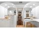 Luxurious bathroom offering dual vanities and a view into the main bedroom at 4810 W San Miguel St, Tampa, FL 33629