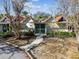 Unique home featuring peaked roofs, symmetrical design and a gated front entrance in a tropical landscape at 4811 Paradise S Way, St Petersburg, FL 33705