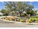Charming home with mature shade tree, manicured landscaping, and a circular driveway at 4811 Paradise S Way, St Petersburg, FL 33705