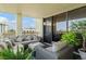 Charming balcony retreat with comfortable seating, serene ambiance, and a relaxing outdoor experience at 5701 Mariner St # 606, Tampa, FL 33609