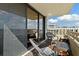 Wicker chairs and table on balcony at 5701 Mariner St # 606, Tampa, FL 33609