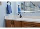 Stylish bathroom featuring new countertops, sink, mirror, and an updated shower at 5701 Mariner St # 606, Tampa, FL 33609