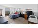 Bright bedroom with a balcony, featuring a desk area and comfortable sleeping space at 5701 Mariner St # 606, Tampa, FL 33609