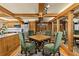 Traditional dining room with wood accents and seating for four at 5701 Mariner St # 606, Tampa, FL 33609