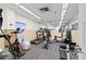 Well-equipped fitness center with treadmills, bikes, weights, and mirrored wall for exercise at 5701 Mariner St # 606, Tampa, FL 33609