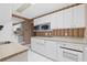 Galley kitchen with plenty of cabinet space at 5701 Mariner St # 606, Tampa, FL 33609