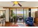 Comfortable living room with sliding glass doors to the outdoor patio at 5701 Mariner St # 606, Tampa, FL 33609