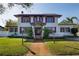 Charming home features a well-manicured lawn and inviting entryway at 6342 5Th N Ave, St Petersburg, FL 33710