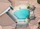 Aerial view of a stunning backyard pool, unique patio layout and tile roof at 11158 Warm Wind Way, Weeki Wachee, FL 34613