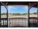 Balcony with open view of green fields at 11158 Warm Wind Way, Weeki Wachee, FL 34613