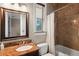 Bathroom features granite counters, a bath tub, and marble tile at 11158 Warm Wind Way, Weeki Wachee, FL 34613