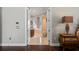 Entrance to an elegant main bedroom featuring a private ensuite bathroom at 11158 Warm Wind Way, Weeki Wachee, FL 34613