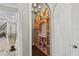 Charming wine cellar displaying wooden racks for wine storage at 11158 Warm Wind Way, Weeki Wachee, FL 34613