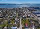 Aerial view of a coastal community with homes near beaches and ocean waters at 2709 57Th S St, Gulfport, FL 33707