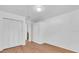An empty bedroom with hardwood floors and closet space at 2709 57Th S St, Gulfport, FL 33707