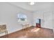 Bonus room features hardwood floors, a mini fridge, and natural light at 2709 57Th S St, Gulfport, FL 33707