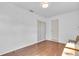 A vacant room with hardwood floors, ready for customization at 2709 57Th S St, Gulfport, FL 33707
