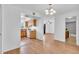 Inviting space with wood flooring connecting kitchen, living, and bathroom areas at 2709 57Th S St, Gulfport, FL 33707