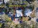 Aerial view of property showing approximate boundaries and surrounding trees and neighborhood at 817 Wilkie St, Dunedin, FL 34698
