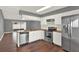 Modern kitchen with stainless steel appliances and a stainless steel sink at 912 Lochmont Dr, Brandon, FL 33511