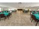 Expansive clubhouse with tables and chairs set up for a large event or community function at 11427 Turtle Dove Pl, New Port Richey, FL 34654
