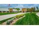 The community clubhouse offers a place to meet with beautiful landscaping and a manicured lawn at 11427 Turtle Dove Pl, New Port Richey, FL 34654