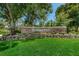 The SummerTree community sign sits atop a stone and landscaping feature creating a welcoming entrance at 11427 Turtle Dove Pl, New Port Richey, FL 34654