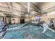 This is a large gym with treadmills, weights, and other exercise machines for a complete workout at 11427 Turtle Dove Pl, New Port Richey, FL 34654