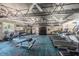 Large gym with cardio machines, weights, and exercise equipment, perfect for a full-body workout at 11427 Turtle Dove Pl, New Port Richey, FL 34654