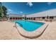 Large community pool with ample space for swimming and sunbathing at 11427 Turtle Dove Pl, New Port Richey, FL 34654