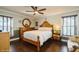 Bedroom with hard wood floors, neutral walls, ceiling fan and traditional furniture at 3053 Glenwood Ct, Safety Harbor, FL 34695