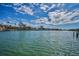 Beautiful view of the waterfront and nearby houses, showcasing the desirable coastal living and scenic surroundings at 3390 W Maritana Dr # 4, St Pete Beach, FL 33706