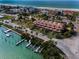 Charming waterfront property with a multi-story building, scenic water views, and convenient boat docks for coastal living at 3390 W Maritana Dr # 4, St Pete Beach, FL 33706