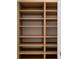Spacious closet with wooden shelving for organized storage and a clean aesthetic at 5120 Marina Way # 15006, Tampa, FL 33611