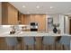 Open kitchen with island seating, sleek countertops, and stainless steel appliances at 5120 Marina Way # 15006, Tampa, FL 33611