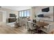 Open-concept living area with floor-to-ceiling windows and modern furnishings with great city views at 5120 Marina Way # 15006, Tampa, FL 33611
