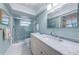 Bathroom showcasing a glass shower and a spacious vanity at 5130 Brittany S Dr # 201, St Petersburg, FL 33715