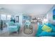 Comfortable living area with stylish decor, an open layout, and partial water views at 5130 Brittany S Dr # 201, St Petersburg, FL 33715