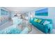 Inviting living room featuring stylish furnishings, artwork, and an open layout to the kitchen at 5130 Brittany S Dr # 201, St Petersburg, FL 33715