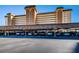 Condominium parking featuring covered spaces under the building in a well lit area at 5130 Brittany S Dr # 201, St Petersburg, FL 33715