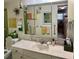 Bathroom with a vanity, a mirror, and green accents, complete with decorative touches at 5980 Shore S Blvd # 510, Gulfport, FL 33707