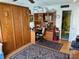 Bedroom with a murphy bed, desk, and shelving for a multi-purpose and space-saving design at 5980 Shore S Blvd # 510, Gulfport, FL 33707